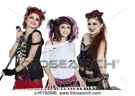 Beautiful young punk woman with piano and microphone over white background View Large Photo Image Stock Photograph - Beautiful young punk woman with piano and microphone over white background. Fotosearch