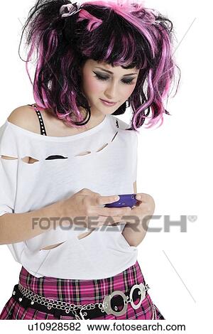 Beautiful young woman text messaging over white background View Large Photo Image Stock Image - Beautiful young woman text messaging over white background. Fotosearch
