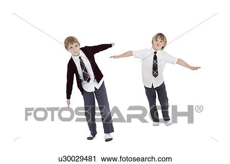 Boys with arms outstretched over white background View Large Photo Image Stock Image - Boys with arms outstretched over white background. Fotosearch