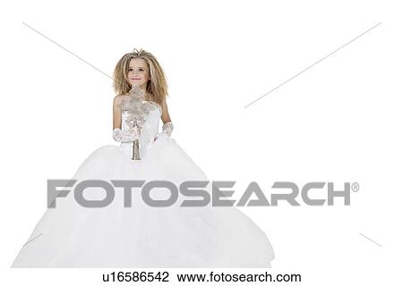 Bride girl holding crucifix wearing wedding gown over white background View Large Photo Image Stock Image - Bride girl holding crucifix wearing wedding gown over white background. Fotosearch