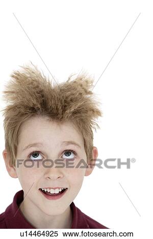 Close-up of blond boy looking up over white background View Large Photo Image Stock Photography - Close-up of blond boy looking up over white background. Fotosearch
