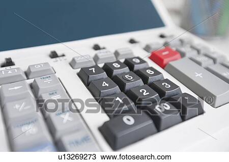 Stock Image - Close-up of calculator. Fotosearch