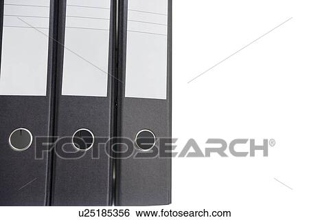 Stock Photograph - Close-up of file folder over white background. Fotosearch