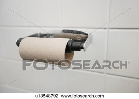 Close-up of finished toilet paper roll in bathroom View Large Photo Image Stock Image - Close-up of finished toilet paper roll in bathroom. Fotosearch
