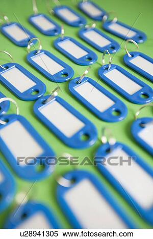 Stock Photography - Close-up of key rings with tags. Fotosearch