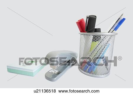 Close-up of office supplies over white background View Large Photo Image Stock Photo - Close-up of office supplies over white background. Fotosearch