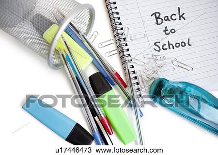 Close-up of office supplies with spiral notebook View Large Photo Image Stock Image - Close-up of office supplies with spiral notebook. Fotosearch