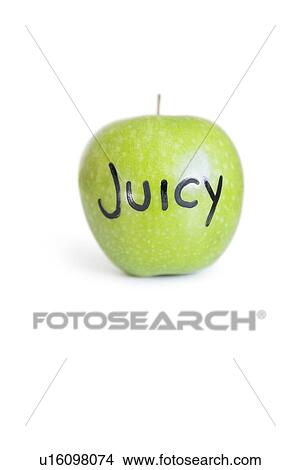 Picture - Close-up of orthographic text on a juicy granny smith apple over white background. Fotosearch