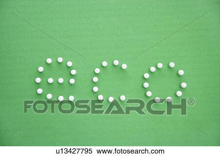Close-up of push pins spelling eco over green background View Large Photo Image Stock Photography - Close-up of push pins spelling eco over green background. Fotosearch
