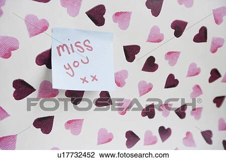 Close-up of sticky note with a message over heart shaped wall View Large Photo Image Stock Image - Close-up of sticky note with a message over heart shaped wall. Fotosearch