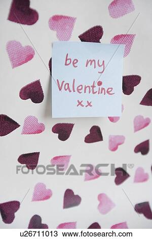 Close-up of sticky note with a orthographic message over heart shaped background View Large Photo Image Stock Image - Close-up of sticky note with a orthographic message over heart shaped background. Fotosearch