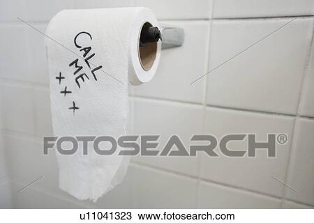 Close-up of toilet paper with text in bathroom View Large Photo Image Stock Image - Close-up of toilet paper with text in bathroom. Fotosearch
