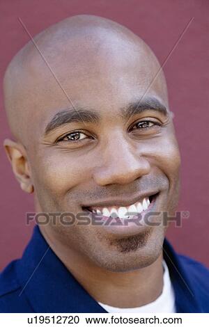 Close-up portrait of a happy young man View Large Photo Image Stock Image - Close-up portrait of a happy young man. Fotosearch