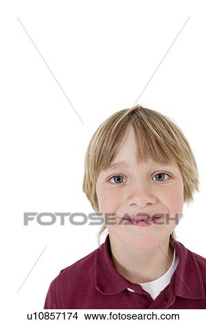 Close-up portrait of a school boy over white background View Large Photo Image Picture - Close-up portrait of a school boy over white background. Fotosearch