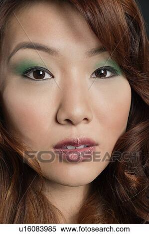 Stock Photography - Close-up portrait of beautiful Chinese woman. Fotosearch