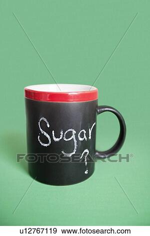 Stock Photo - Coffee cup with text over colored background. Fotosearch
