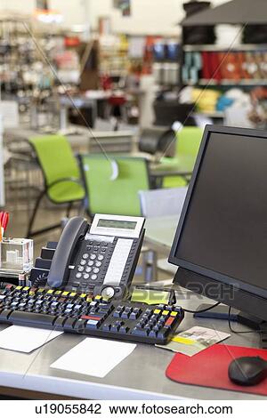 Computer with landline phone in store counter View Large Photo Image Stock Image - Computer with landline phone in store counter. Fotosearch