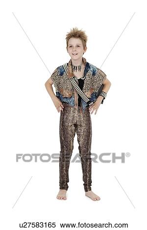 Stock Photography - Front view of blond boy with hands on hips in outfit over white background. Fotosearch