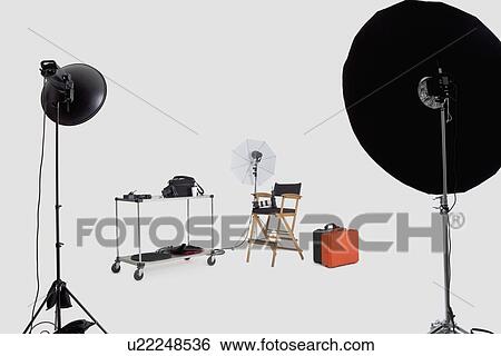Stock Photograph - Lighting equipments in photographer's studio. Fotosearch