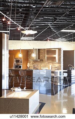 Model of contemporary kitchen in store View Large Photo Image Stock Image - Model of contemporary kitchen in store. Fotosearch