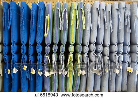 Multicolored cushions hanging in store View Large Photo Image Stock Image - Multicolored cushions hanging in store. Fotosearch