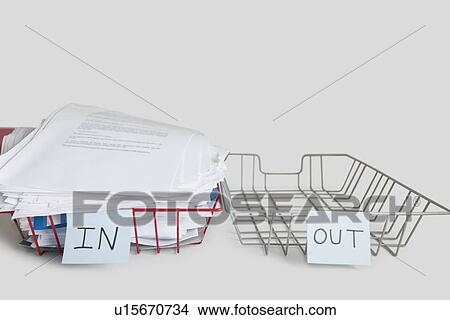 Pile of papers in office tray over white background View Large Photo Image Picture - Pile of papers in office tray over white background. Fotosearch