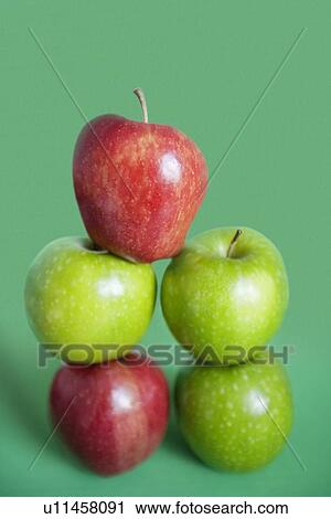 Pile of red and green apples over colored background View Large Photo Image Stock Image - Pile of red and green apples over colored background. Fotosearch