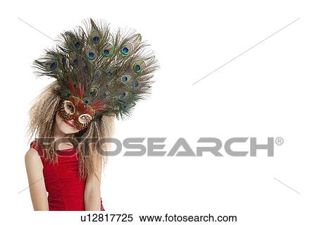 Portrait of a girl in peacock feather mask over white background View Large Photo Image Stock Photography - Portrait of a girl in peacock feather mask over white background. Fotosearch