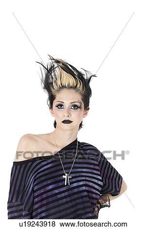 Portrait of a gothic woman with spiked hair over white background View Large Photo Image Stock Photo - Portrait of a gothic woman with spiked hair over white background. Fotosearch