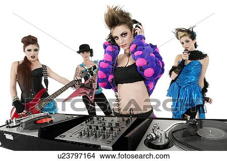Portrait of all female punk rock band over white background View Large Photo Image Picture - Portrait of all female punk rock band over white background. Fotosearch
