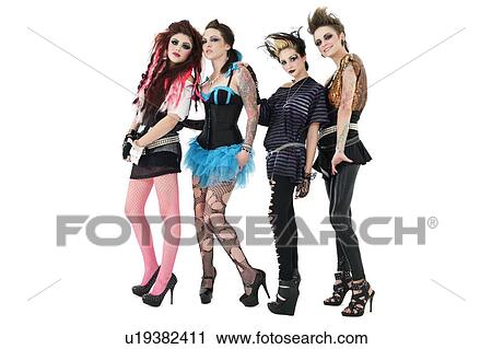 Portrait of beautiful all female rock band over white background View Large Photo Image Stock Image - Portrait of beautiful all female rock band over white background. Fotosearch