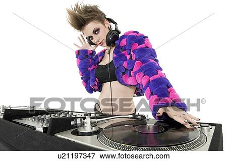 Stock Photo - Portrait of beautiful DJ over white background. Fotosearch