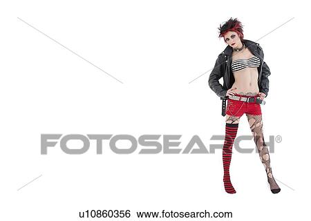 Portrait of beautiful young punk woman posing over white background View Large Photo Image Stock Photograph - Portrait of beautiful young punk woman posing over white background. Fotosearch