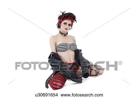 Portrait of beautiful young woman wearing leather jacket over white background View Large Photo Image Picture - Portrait of beautiful young woman wearing leather jacket over white background. Fotosearch