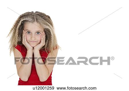 Portrait of bored girl in red outfit over white background View Large Photo Image Stock Photo - Portrait of bored girl in red outfit over white background. Fotosearch