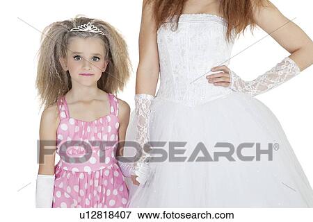 Portrait of bridesmaid holding bride's hand View Large Photo Image Stock Photo - Portrait of bridesmaid holding bride's hand. Fotosearch