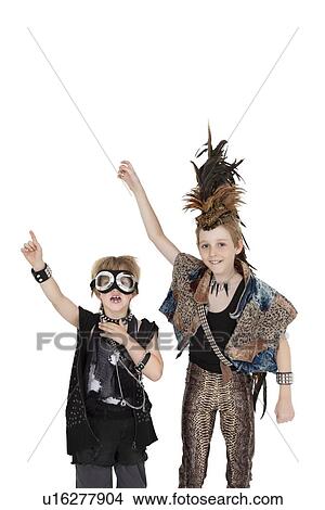 Portrait of friends in outfit with hands raised over white background View Large Photo Image Picture - Portrait of friends in outfit with hands raised over white background. Fotosearch