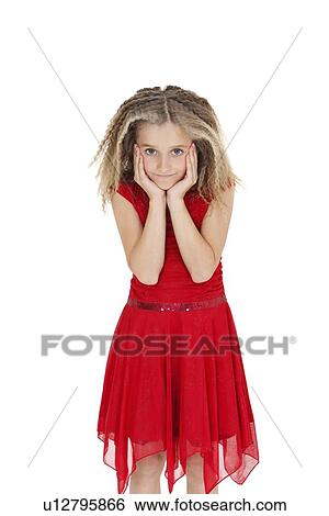 Portrait of girl in red frock with head in hands over white background View Large Photo Image Stock Photograph - Portrait of girl in red frock with head in hands over white background. Fotosearch