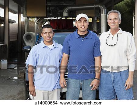 Portrait of owner with employee in car wash View Large Photo Image Picture - Portrait of owner with employee in car wash. Fotosearch