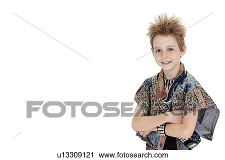 Portrait of pre-teen boy standing with arms crossed over white background View Large Photo Image Stock Image - Portrait of pre-teen boy standing with arms crossed over white background. Fotosearch