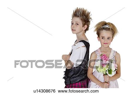Portrait of punk boy with bridesmaid holding flower bouquet over white background View Large Photo Image Stock Photograph - Portrait of punk boy with bridesmaid holding flower bouquet over white background. Fotosearch