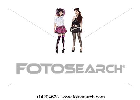 Portrait of punk females standing over white background View Large Photo Image Stock Image - Portrait of punk females standing over white background. Fotosearch