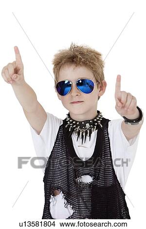 Portrait of punk kid pointing with arms raised over white background View Large Photo Image Picture - Portrait of punk kid pointing with arms raised over white background. Fotosearch
