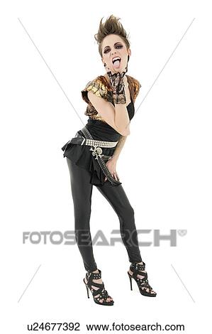 Portrait of punk woman sticking out tongue with rock sign over white background View Large Photo Image Stock Image - Portrait of punk woman sticking out tongue with rock sign over white background. Fotosearch