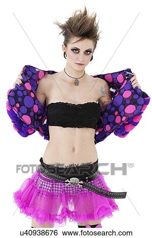 Stock Photograph - Portrait of punk woman with open jacket over white background. Fotosearch
