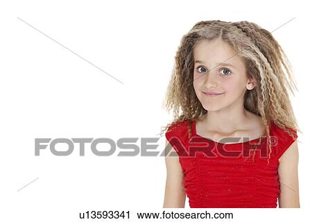 Portrait of school girl in red outfit over white background View Large Photo Image Stock Image - Portrait of school girl in red outfit over white background. Fotosearch