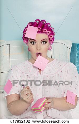 Portrait of shocked woman with sticky notes on herself View Large Photo Image Stock Image - Portrait of shocked woman with sticky notes on herself. Fotosearch