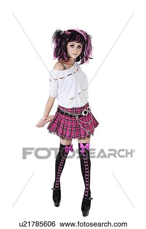 Stock Photograph - Portrait of young female wearing wig posing over white background. Fotosearch