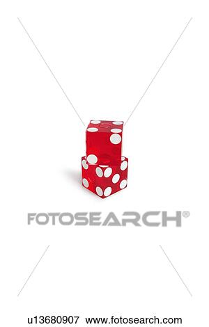 Stock Photo - Red gambling dice over white background. Fotosearch