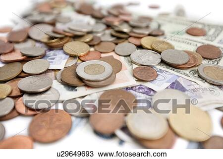 Stock Image - Selective focus of currencies. Fotosearch